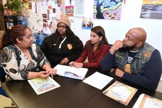 Discussing the next steps in their efforts to build up Brooklyn Collegiate