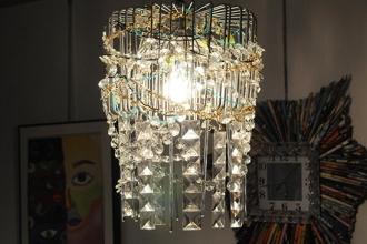 A handmade chandelier that the students wired to light up.