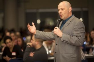 Mulgrew addresses the charter school members gathered in Shanker Hall. Several h