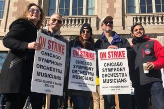 Chicago Symphony Orchestra musicians and their supporters picket outside Symphon