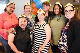 UFT District 21 Representative Kate O’Hagan (back row, center) joins reps of IS 