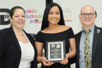 Paraprofessional honoree Argelis Capellan of PS 47 with District 12 Superintende