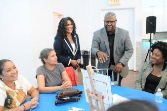 UFT District 6 Representative Mayra Cruz (standing, left) and UFT Assistant Secr