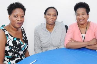 Danielle Philibert (left) introduces colleagues Novella Nicholson (center) and C