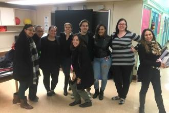 Members at PS 368 ore black and safety pins to demonstrate their commitment