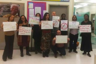 Staff at the HS of American Studies in the Bronx stood together against hate