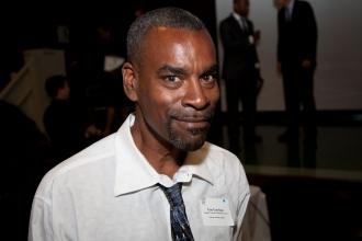 Educator Guy Garrison, who accepted a gold award on behalf of his school, Brookl