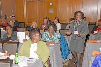Dr. Gloria Boseman (standing), a registered nurse and a professor at New Jersey 