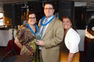 Special Representative Carl Cambria, who received the Service Award, is flanked 