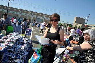 Lisa Gilbride,  joins in the hunt with children, parents and other educators.