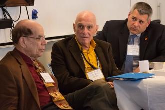 Listening to speakers are (from left) Jack Zevin, Bob Dytell and Joseph Zingone.