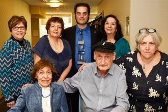 Chairperson Demetra Savopolis (back row, right) and historical consultant and co