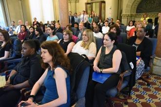The honorees listen at the event.