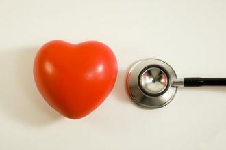 Plastic heart and stethoscope