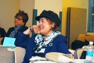 Angie Yanas shows her appreciation for a colorful story.