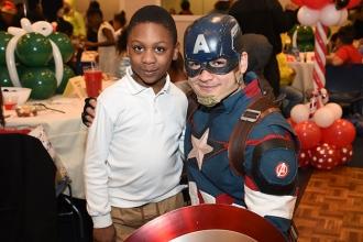 Dominick can’t believe he’s having his picture taken with Captain America.