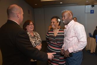 Sharing a laugh are (from left) UFT President Michael Mulgrew; Doreen Raftery, t