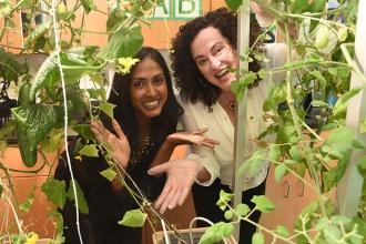 PS 349 science teachers Sheena Mathew and Amy Schier show off the now-thriving h