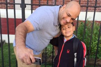 A back-to-school father/son selfie at PS 199 in Brooklyn
