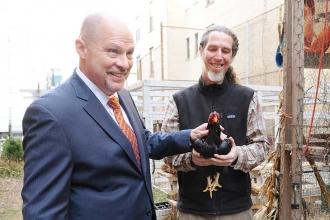 Mulgrew meets rooster Little Joe, held by science teacher Jason Godlewicz, at th