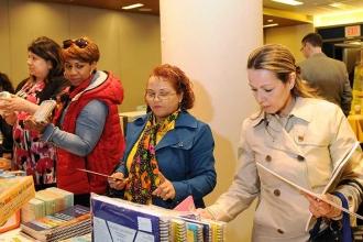 School counselors peruse educational materials at the vendor fair during the ann