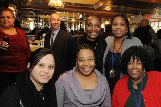 UFT District 16 Representative Camille Eaddy (standing, second from right) and P