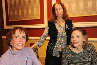 Sharing chapter leader stories at the breakfast reception are (from left) Penina