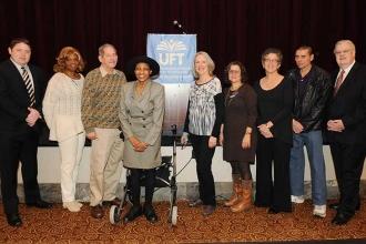 Former middle school chapter leaders, flanked by Messner (left) and Murphy, are 