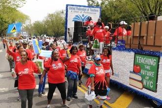 Marchers break into a dance.