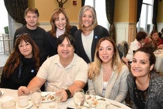 UFT Staten Island Borough Representative Debra Penny (standing, center) with mem