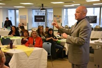 UFT President Michael Mulgrew greets lead teacher assistants and thanks them for