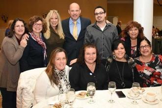 President Mulgrew (standing, center) with members from IS 34, IS 51 and PS 52.