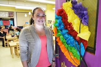 Pre-K teacher Michelle Renna welcomes Mulgrew into her classroom at PS 23 in Bed