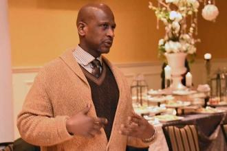 Esrom Johnson, a special education teacher at Port Richmond HS, asks a question.