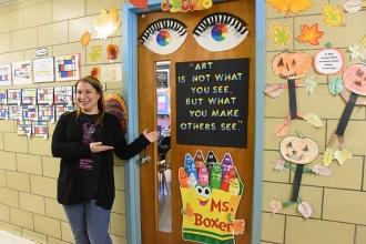 Chapter Leader Randi Boxer shows off her PS 152 K–1st-grade art classroom, with 