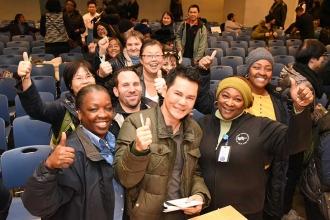 Tom Pang (center) and other members of the Visiting Nurse Service UFT chapter su