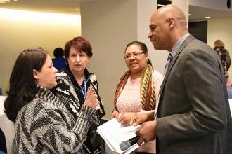 Clayton Newman, a leaves supervisor for the Department of Education, engages in 