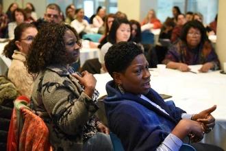 Marleen Blair of JHS 352 in Brooklyn asks a question.