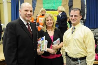 Micahel Mulgrew, Florence Kane and Sean Rotkowitz take part in the distribution.