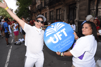 Cynthia Bonano, a parent advocate, marches with her son, Sean.