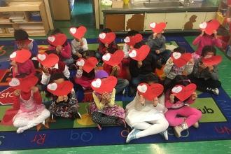 Kindergarteners show love at PS 131 in Jamaica Hills, Queens.