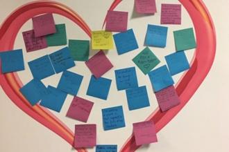 Educators and staff at Brooklyn's Cultural Academy for Arts & Sciences celebrate