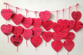 Fourth-graders in Mrs. Toomey and Mrs. Barone's ICT class show love for PS 41 on