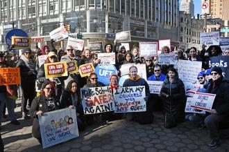 Some of the 300 UFT members who attended the New York City march gathered for a 