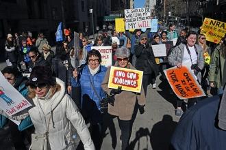 Marchers proceeded down Central Park West.