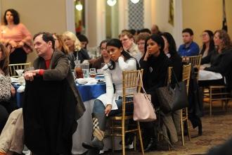 Members from District 31 on Staten Island listen as UFT President Michael Mulgre