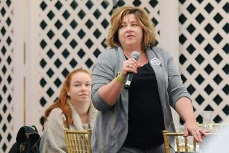 PS 26 paraprofessional Rosemarie Hogan asks a question about paraprofessional ca