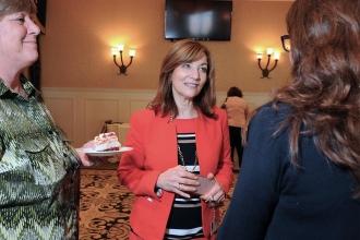 UFT Staten Island Borough Representative Debra Penny talks with members.