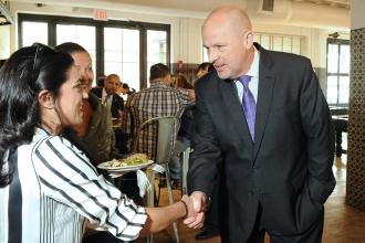 Mulgrew says hello to members from District 20.