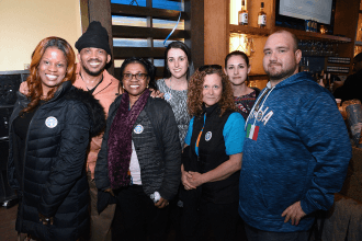 Members from Districts 18 and 19 sport their Union Proud buttons.
